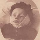 A small boy with bandaged head
